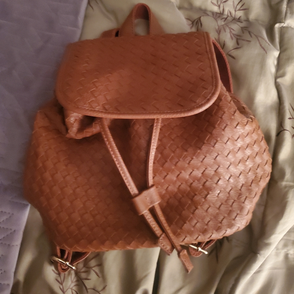 Mini woven leather backpack